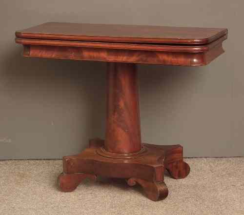 Appraisal: An early Victorian mahogany rectangular tea table with plain folding