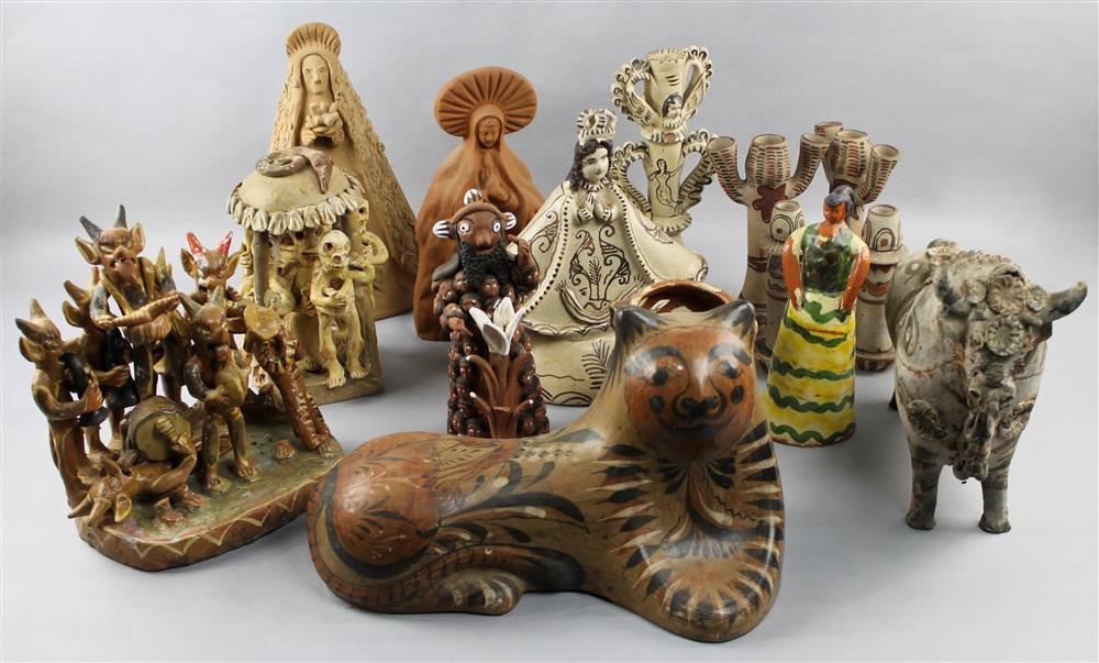 Appraisal: GROUP OF MEXICAN CERAMIC FIGURES AND CANDLESTICKS including a large