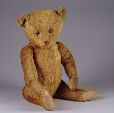 Appraisal: EARLY TEDDY BEAR Fine early honey-colored bear with shoe-button eyes