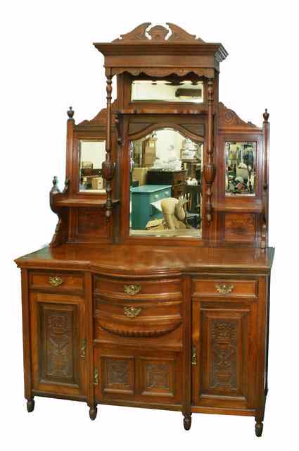 Appraisal: A TH CENTURY AMERICAN WALNUT SIDEBOARD with raised mirrored back