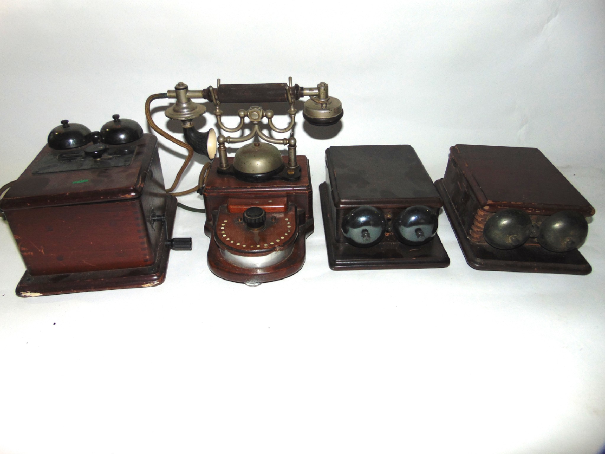 Appraisal: Two timber cased antique telephone units lacking receivers together with