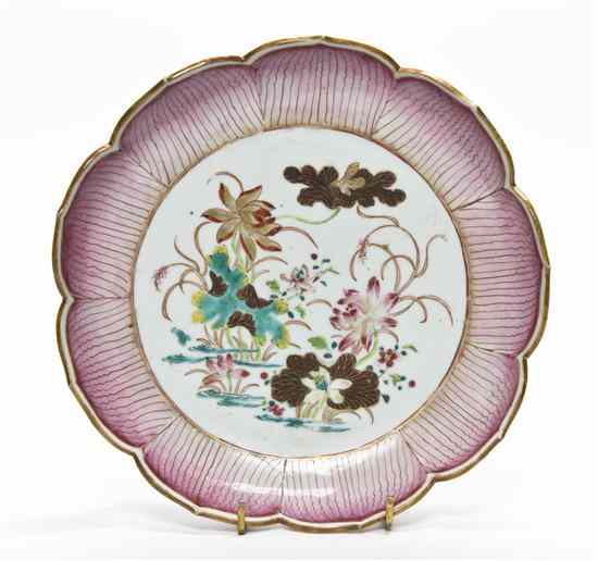 Appraisal: A Chinese Export Porcelain Lotus Form Dish the center polychrome