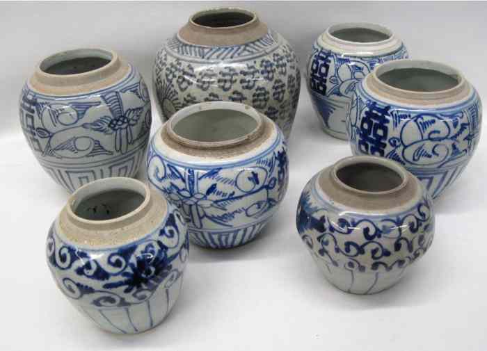 Appraisal: SEVEN CHINESE BLUE AND WHITE POTTERY VASES in a variety