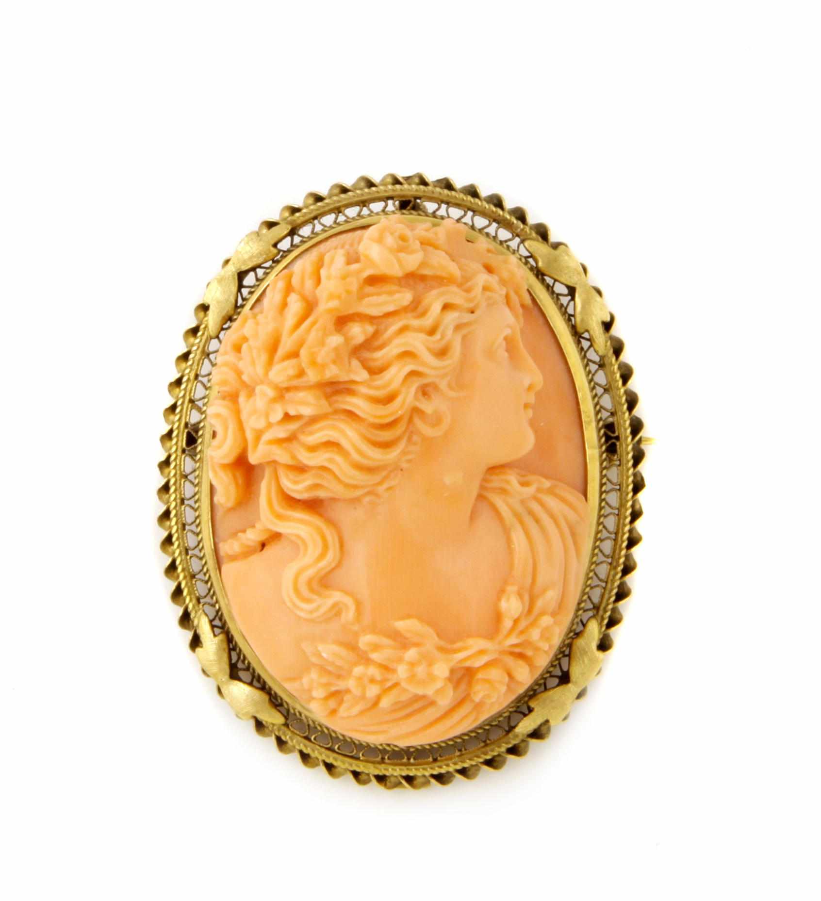 Appraisal: A carved coral and k gold cameo pendant-brooch dimensions x