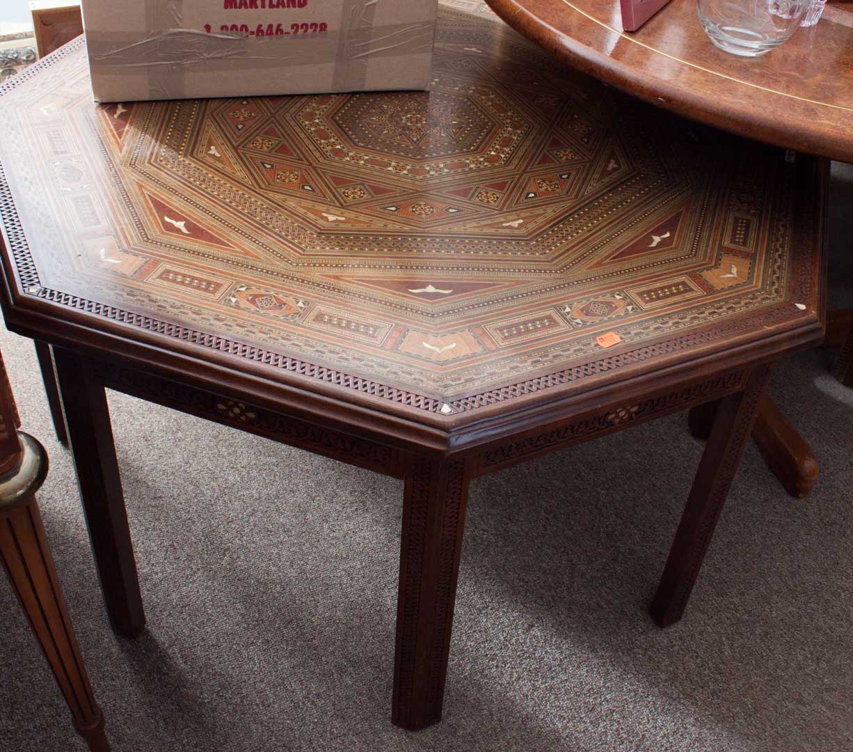 Appraisal: Octagonal inlaid coffee table