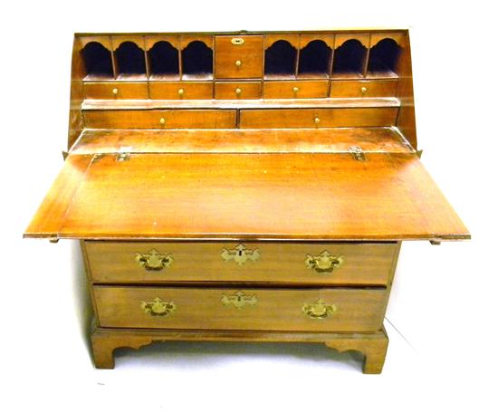 Appraisal: th C four drawer drop front desk pigeonholes and eight