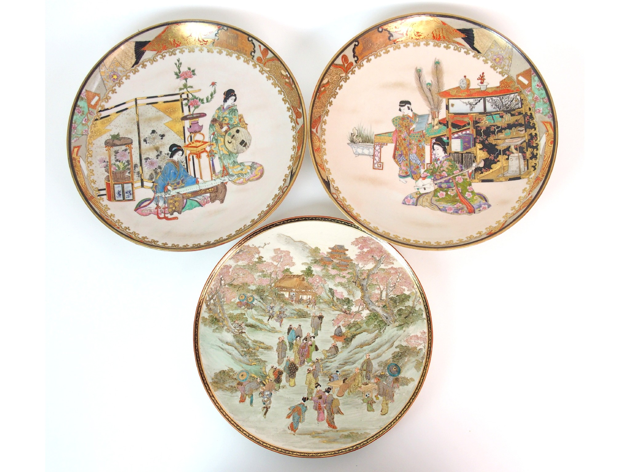 Appraisal: A pair of Japanese dishespainted with ladies playing musical instruments