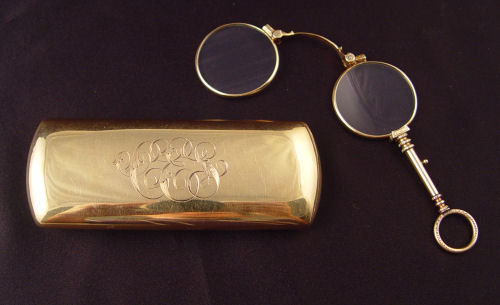 Appraisal: K ANTIQUE LORGNETTE AND K CASE K yellow gold folding