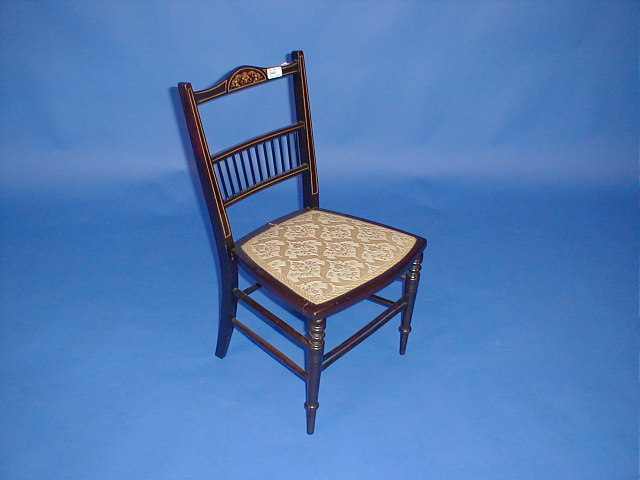 Appraisal: An Edwardian string inlaid bedroom chair