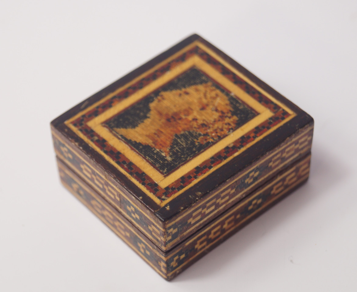 Appraisal: A Tunbridge ware inlaid stamp box with a penny black