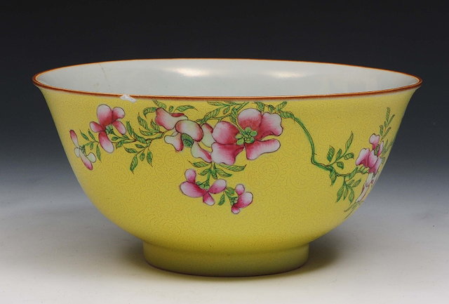 Appraisal: A Chinese yellow ground porcelain bowlGuangxumarks Jiaqing - decorated with