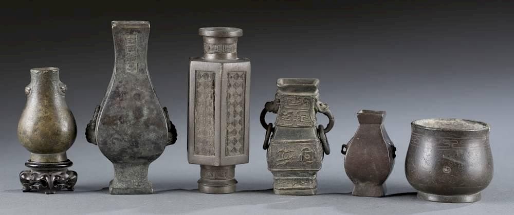 Appraisal: Group of Ching Dynasty miniature bronze vessels A Group of