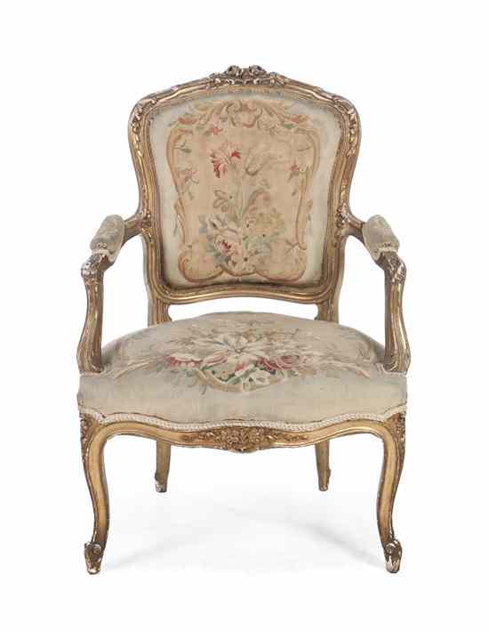 Appraisal: A Louis XV Style Giltwood Fauteuil having a foliate carved