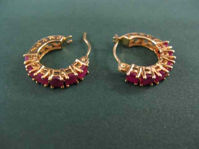 Appraisal: Ruby Earrings each with six round gems approx carats total