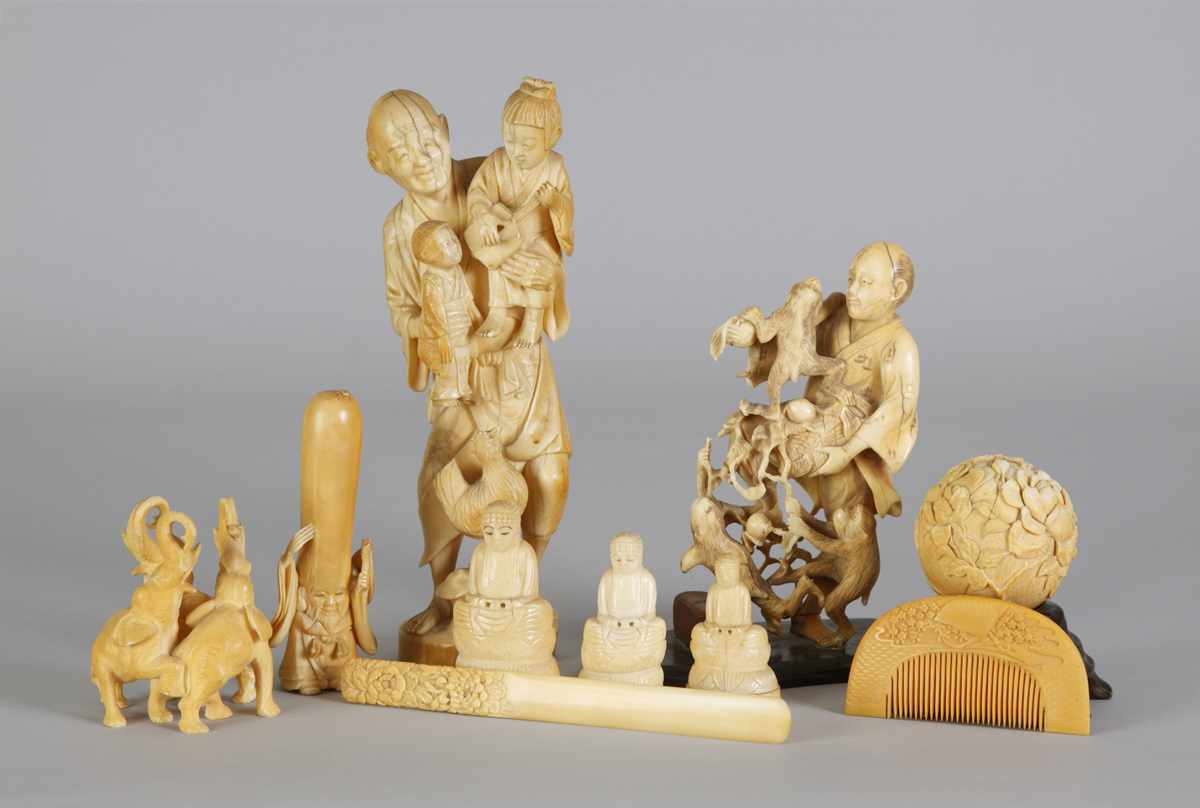 Appraisal: Group of Carved Oriental Figures Accessories Some age cracks Max