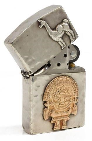 Appraisal: Sterling silver and kt gold lighter Peru with Incan-inspired motifs