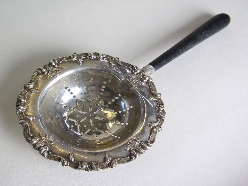 Appraisal: Early th Century sterling silver tea strainer with embossed rim