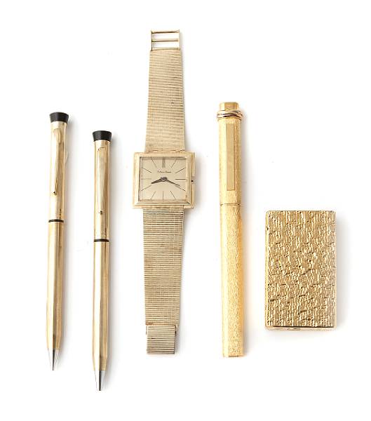 Appraisal: A gold plated collection gold plated pens watch gold plated