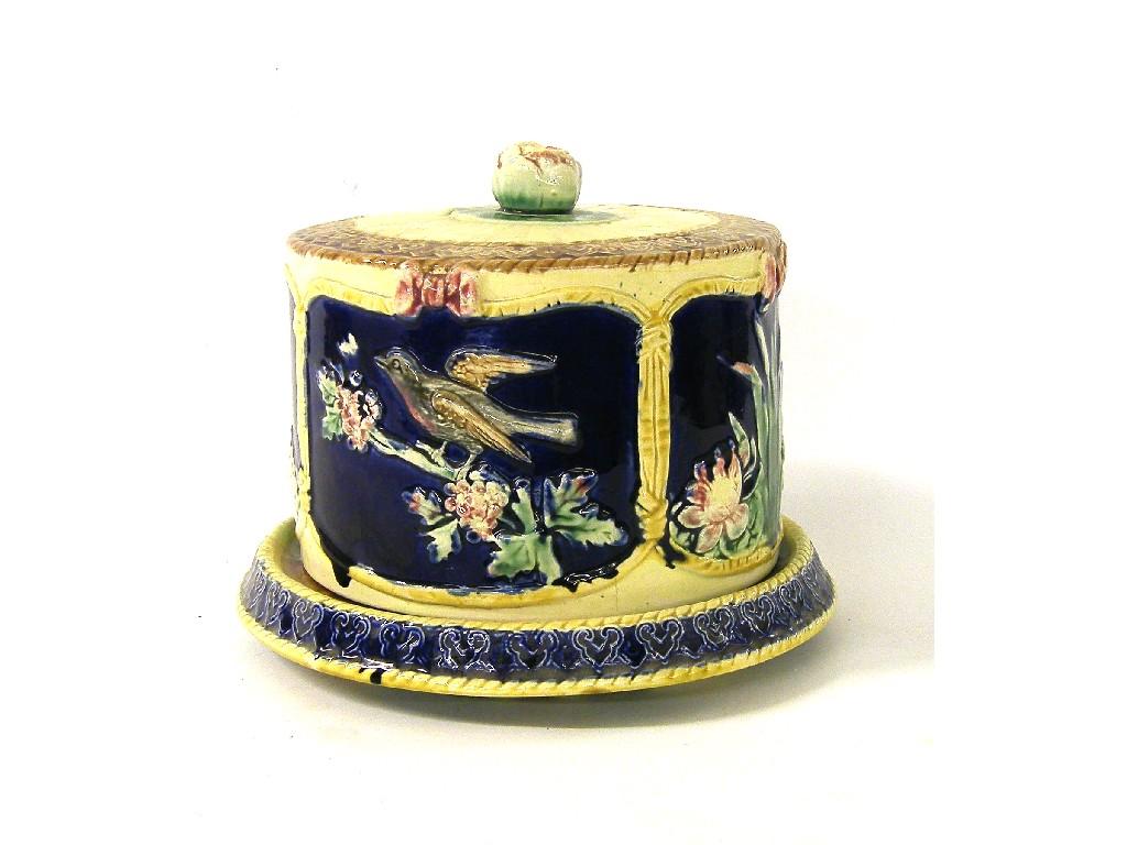 Appraisal: th century majolica circular cheese dish and cover the sides