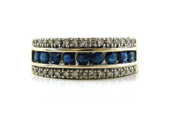 Appraisal: JEWELRY Sapphire and diamond band stamped and tested K white