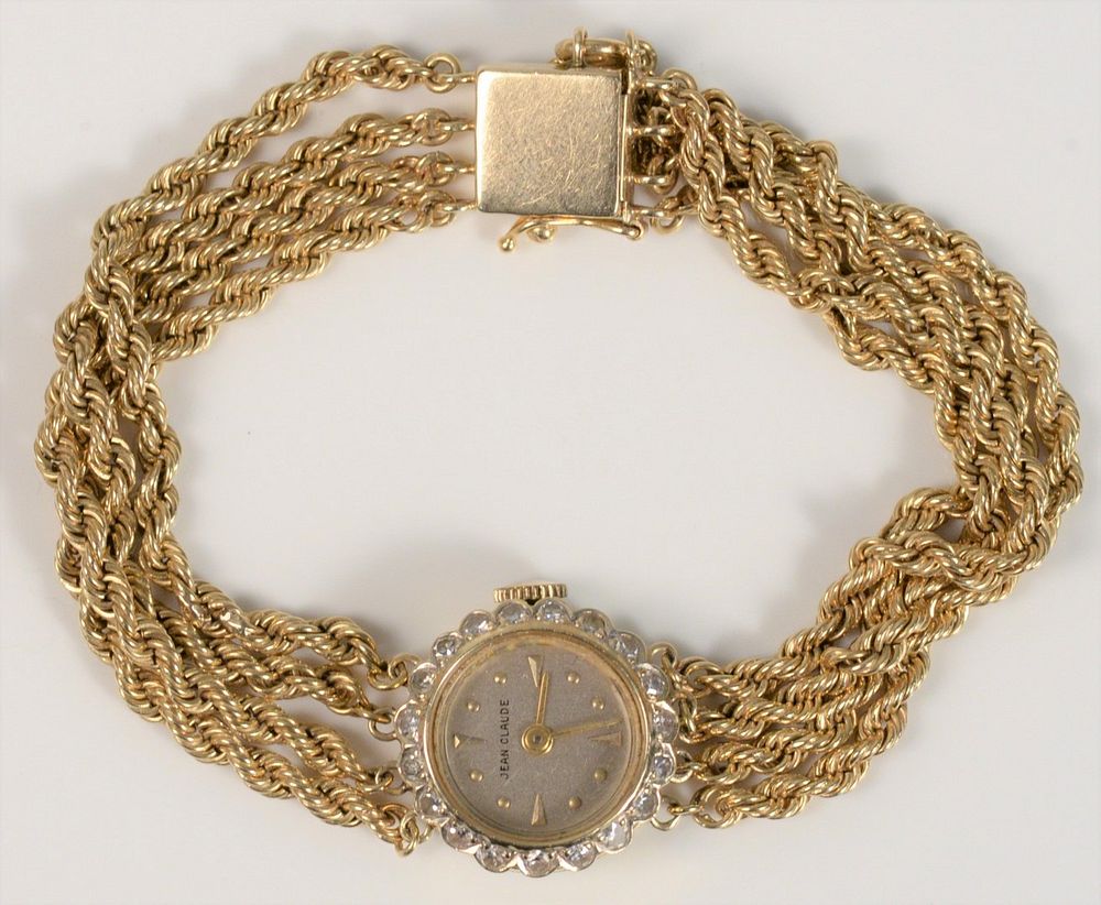 Appraisal: K Jean Claude Women's Wristwatch with four strand gold bracelet