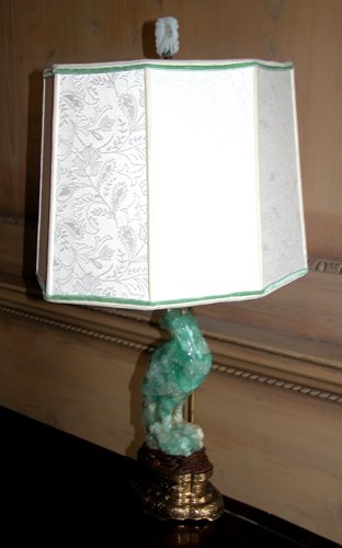 Appraisal: Title Carved Green Onyx Bird mounted as a lamp Medium