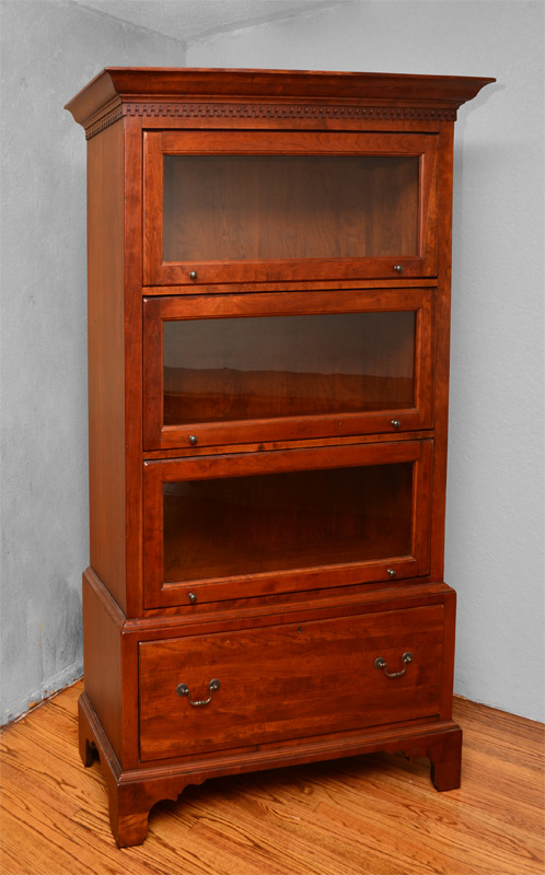 Appraisal: BOB TIMBERLAKE CHERRY BARRISTER BOOKCASE Dentil molding over glass front