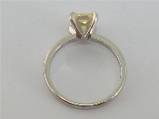 Appraisal: A single stone yellow diamond ring the princess cut stone