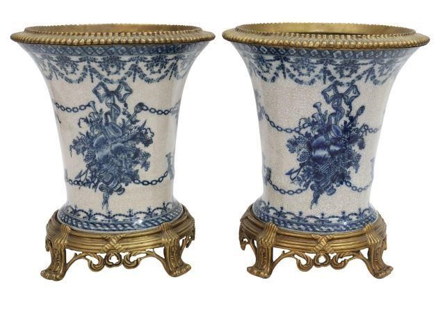 Appraisal: pair Decorative bronze-mounted porcelain vases late th c fluted rim