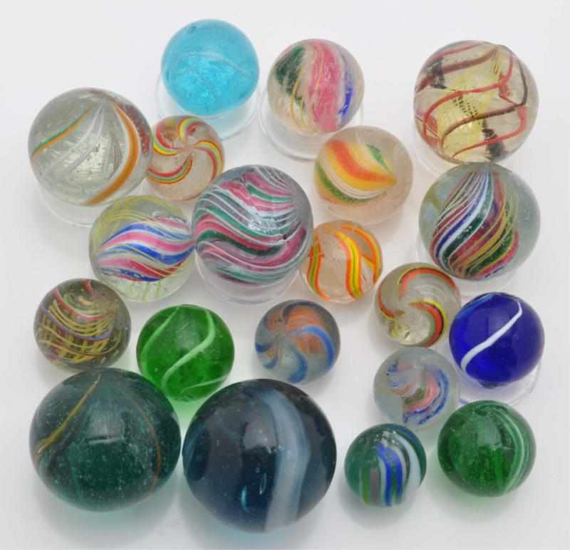 Appraisal: Lot of Handmade Marbles Description Includes latticino coreless double ribbon