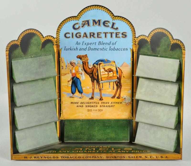 Appraisal: Tin Camel Cigarettes Display Description Nice tin display with beautiful