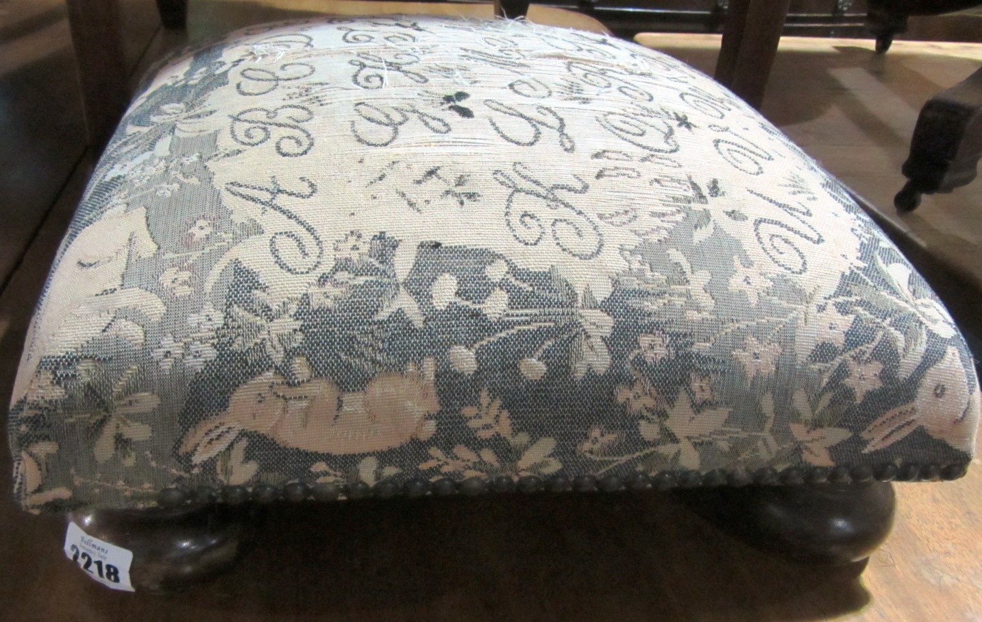 Appraisal: A th century mahogany square footstool with needlework cover