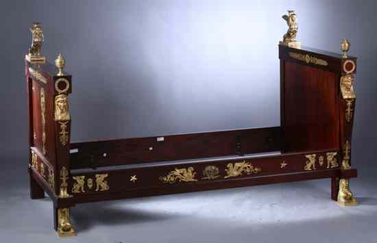 Appraisal: EGYPTIAN REVIVAL MAHOGANY AND GILT-BRONZE MOUNTED DAY BED Paris circa