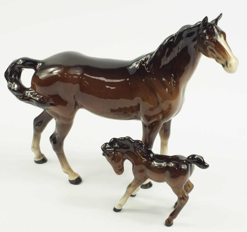 Appraisal: A Beswick figure of a brown gloss swish tail horse