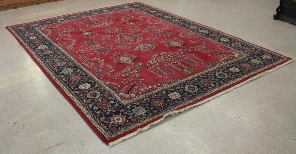 Appraisal: HAND KNOTTED ORIENTAL CARPET Indo-Persian floral sprig design on red