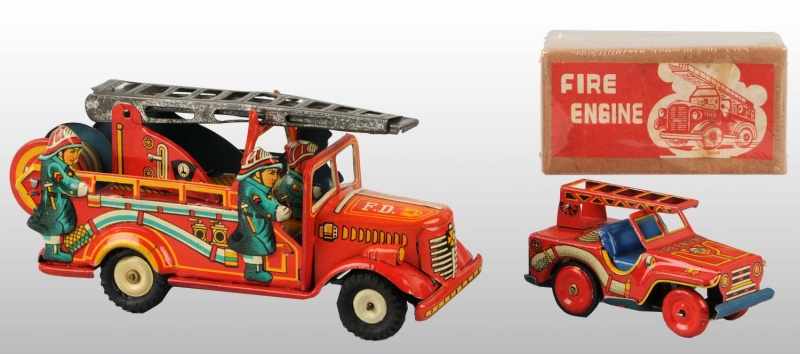 Appraisal: Lot of Tin Litho Fire Truck Friction Toys Description Japanese