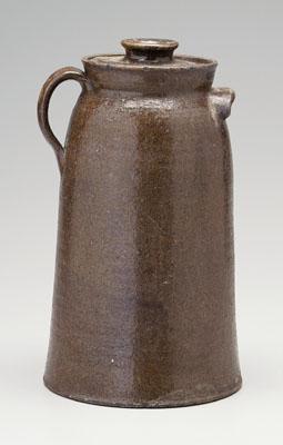 Appraisal: Lucius Jordan stoneware lidded churn tapered form with strap and