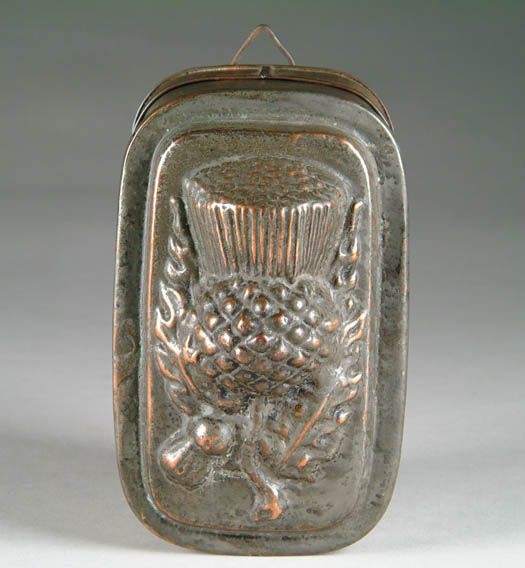 Appraisal: GOOD TWO PART TIN THISTLE MOLD The rectangular copper top