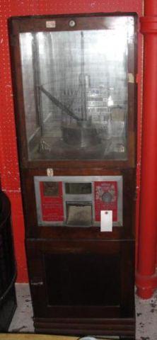 Appraisal: NOVELTY MERCHANTMAN Art Deco Crane Game Machine Manufactured by Exhibit