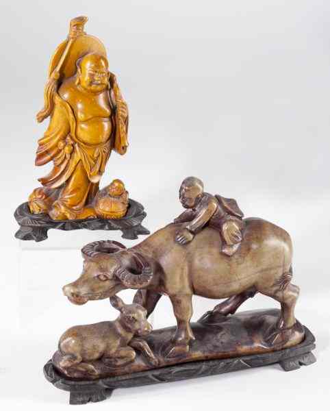 Appraisal: Two Chinese Hardstone Carvingsthe first of a boy riding a