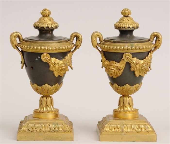 Appraisal: PAIR OF LOUIS XVI-STYLE PATINATED AND GILT-BRONZE CANDLESTICK URNS Each