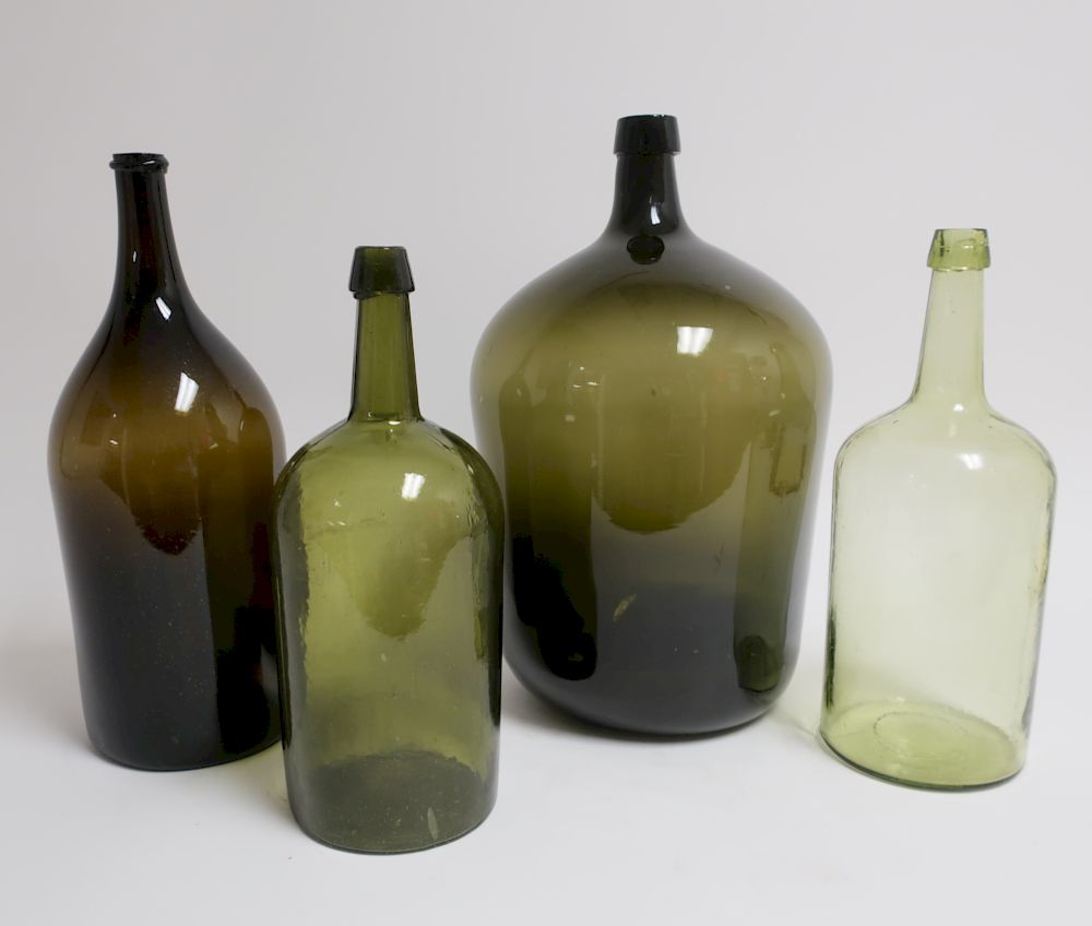 Appraisal: American Large Blown Blown Mold Bottles th c light to