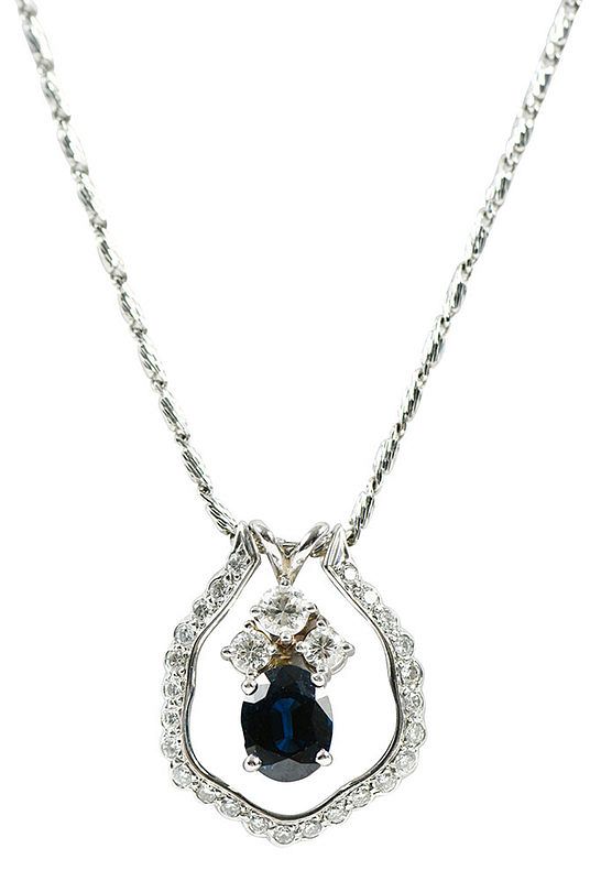 Appraisal: kt Sapphire and Diamond Pendant oval blue sapphire estimated weight