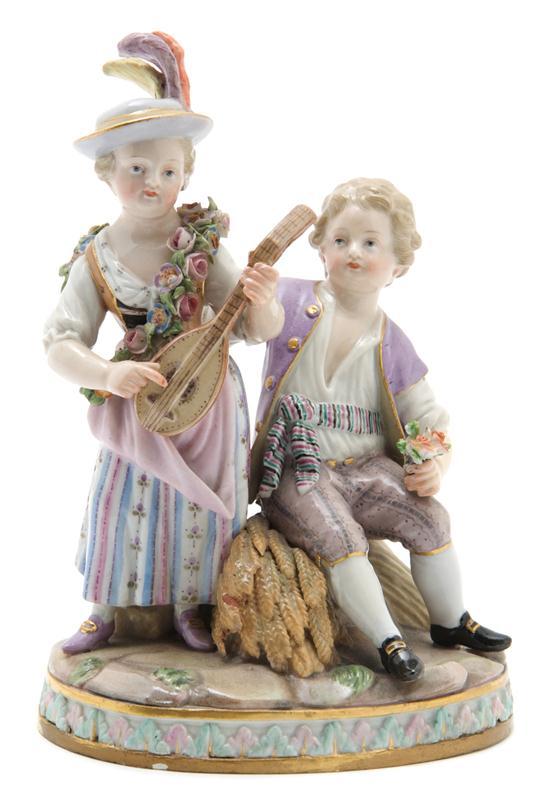 Appraisal: A Meissen Porcelain Figural Group depicting a boy and girl