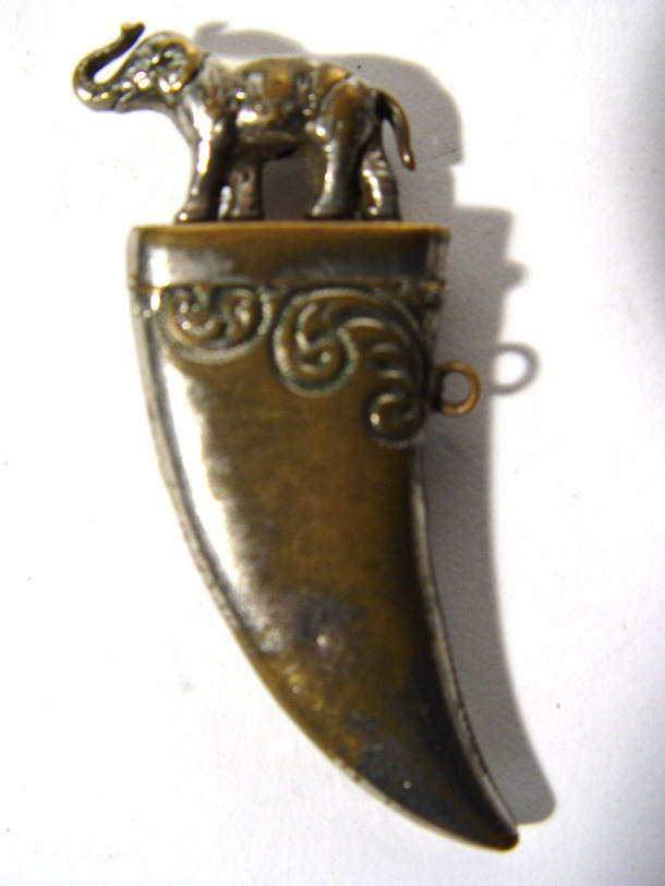 Appraisal: Silver plated tiger's tooth shaped vesta with Indian elephant knop