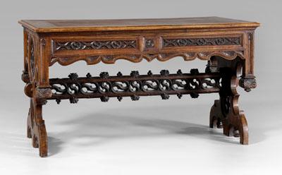 Appraisal: Gothic Revival carved walnut desk paneled top over two dovetailed