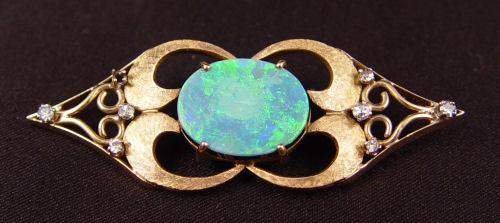 Appraisal: K OPAL DOUBLET AND CTW DIAMOND BROOCH K yellow gold