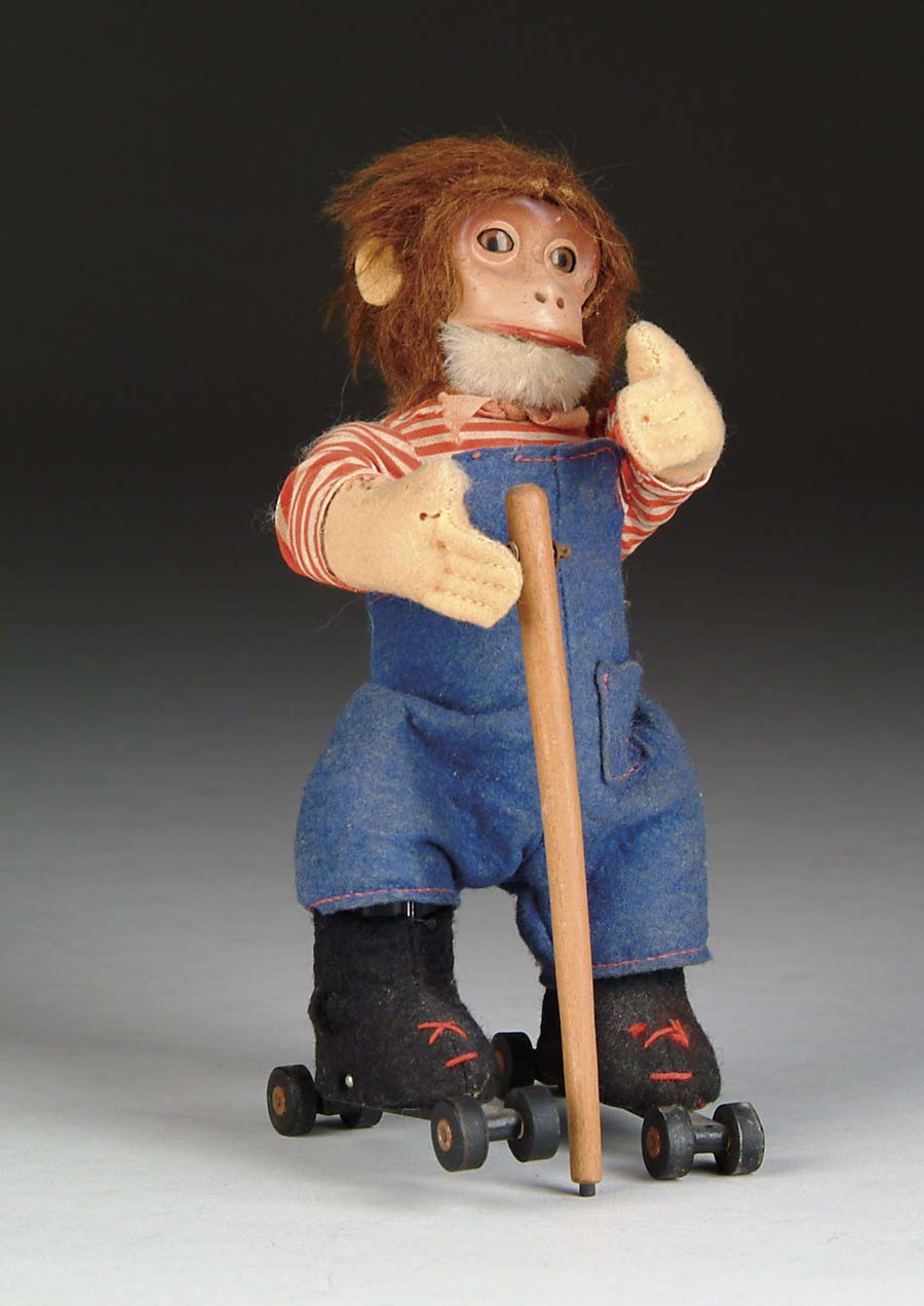 Appraisal: SCHUCO ROLLERSKATING MONKEY U S Zone Germany Felt-covered figure with