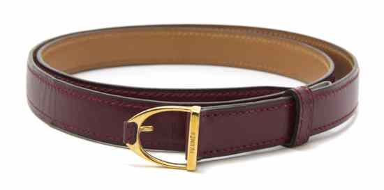 Appraisal: An Hermes 'Etriere' Burgundy Calf Belt with gold buckle Stamped