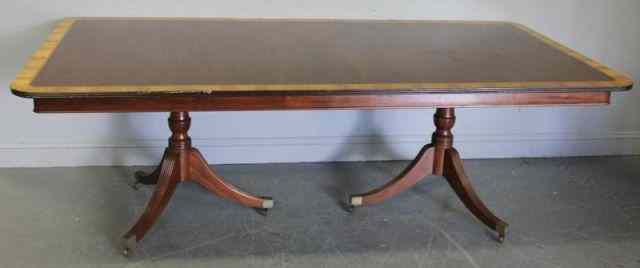 Appraisal: Mahogany Banded Twin Pedestal Dining Table As one solid top